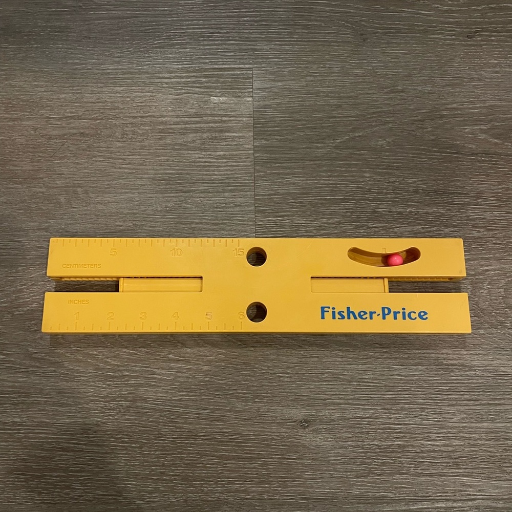 Vintage fisher price leveling tool toy